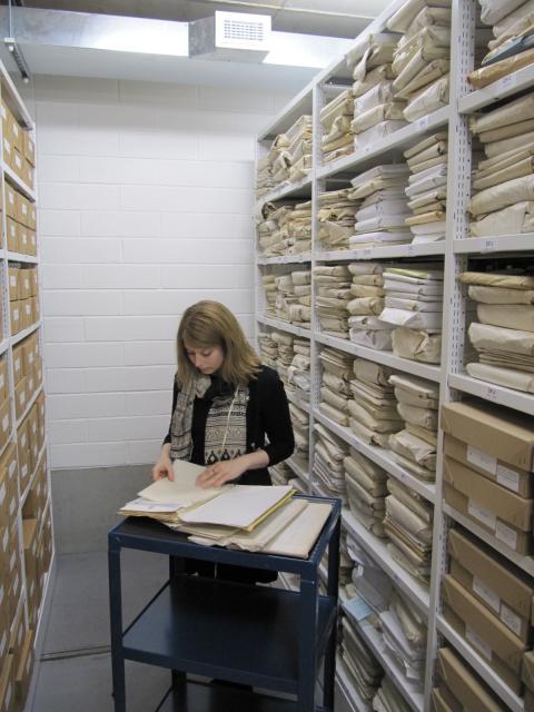 Project Archivist Claire Weatherall with part of the Francis Johnson Collection 